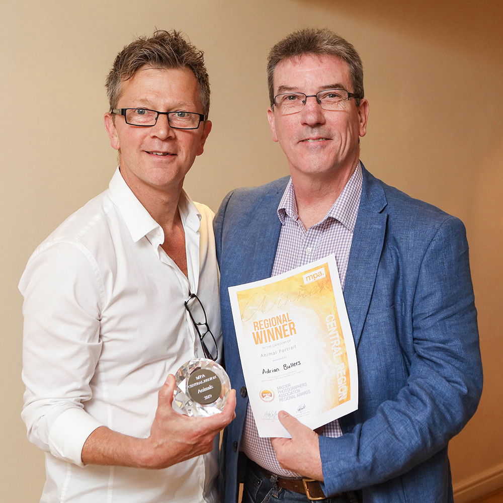 Dog photography specialist Adrian Bullers picking up another Award
